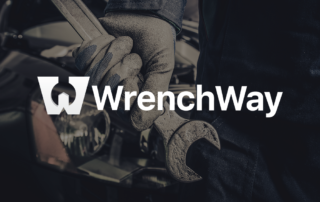 WrenchWay website banner of a technician holding a wrench