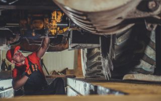 heavy duty mechanic working in a shop