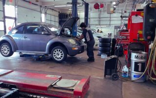 mechanic working on a car